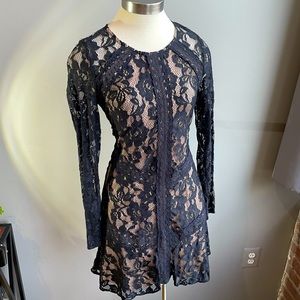 Anthro Everleigh Black and Lace Long sleeved mini dress, Size Medium.